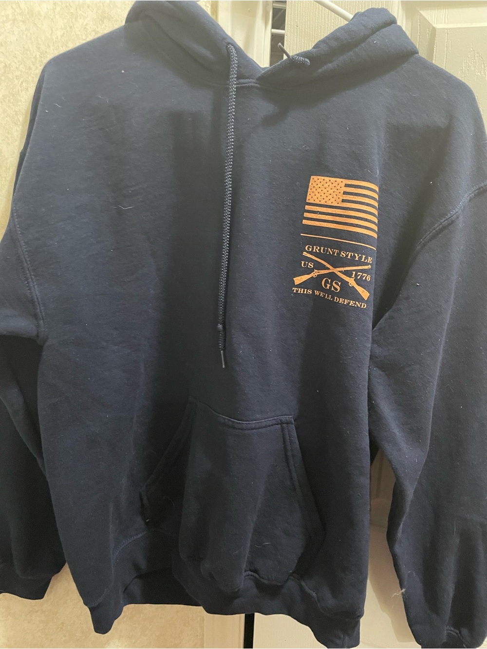 Grunt Style Women’s Navy Hoodie with Flag Graphic